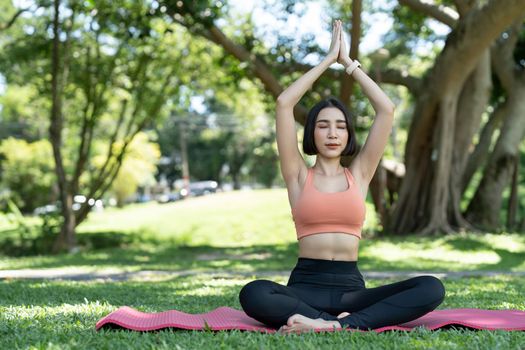 Young woman practicing yoga. Harmony, meditation concept