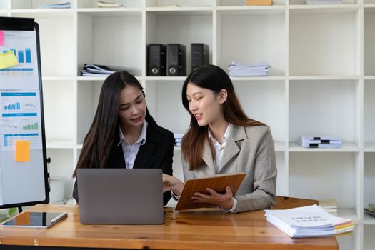 Financial advisor, accounting and Investment concept, business owners consult adviser financial meeting to analyze and on the finance report in the his office room