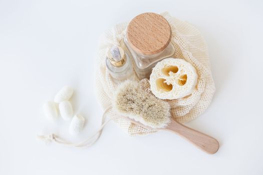 Waste-free starter kit for facial cleansing. Loofah, brush, silkworm sponge. Plastic-free life concept, zero waste