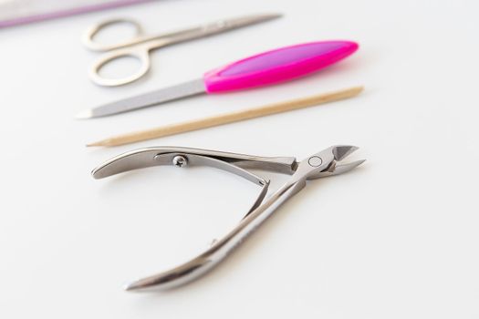 Professional manicure set on a white table. The concept of hand care, salon procedures