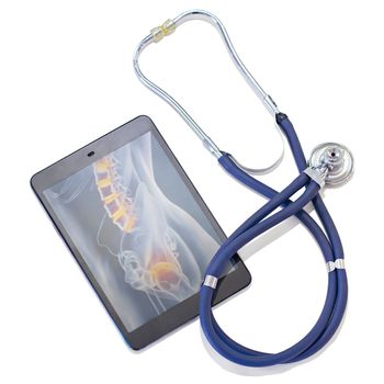 Combining old and new technology for a better outcome. A tablet and a stethoscope against a white background