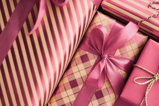 Holiday gifts and wrapped luxury presents, pink gift boxes as surprise present for birthday, Christmas, New Year, Valentines Day, boxing day, wedding and holidays shopping or beauty box delivery concept