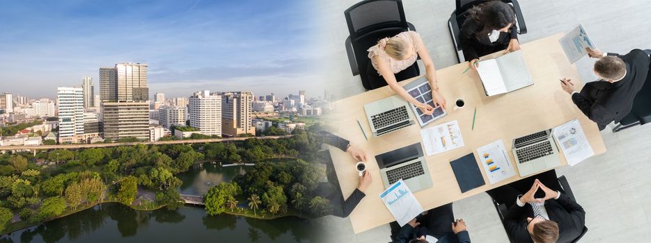 Business people group meeting shot from top widen view in office . Profession businesswomen, businessmen and office workers working in team conference with project planning document on meeting table .