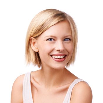 Charming the boys with a radiant smile. Studio shot of a gorgeous young blond woman