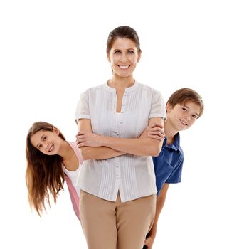 They know Mom is the real boss around here. Portrait of a happy mother standing with her two children beside her