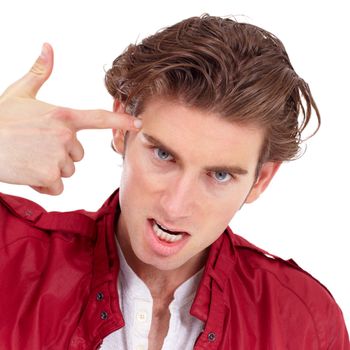 Mondays make most people feel like this...Angry young man posing with his finger against his temple in a handgun gesture