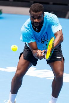 MELBOURNE, AUSTRALIA - JANUARY 13: Frances Tiafoe (USA) practices ahead of the 2023 Australian Open at Melbourne Park on January 13, 2023 in Melbourne, Australia.