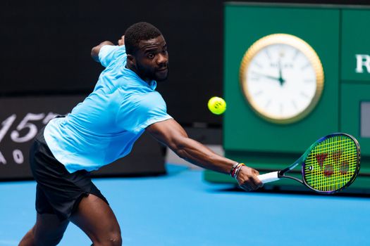 MELBOURNE, AUSTRALIA - JANUARY 13: Frances Tiafoe (USA) practices ahead of the 2023 Australian Open at Melbourne Park on January 13, 2023 in Melbourne, Australia.