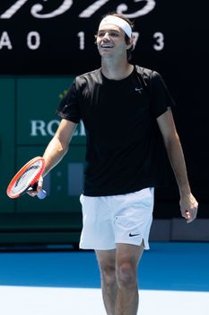 MELBOURNE, AUSTRALIA - JANUARY 13: Taylor Fritz of USA practices ahead of the 2023 Australian Open at Melbourne Park on January 13, 2023 in Melbourne, Australia.