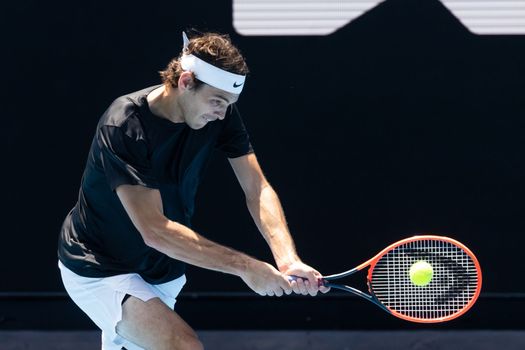 MELBOURNE, AUSTRALIA - JANUARY 13: Taylor Fritz of USA practices ahead of the 2023 Australian Open at Melbourne Park on January 13, 2023 in Melbourne, Australia.