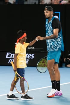 MELBOURNE, AUSTRALIA - JANUARY 13: Nick Kyrgios of Australia and Thaadhie Karunanayake celebrate a point against Novak Djokovic and Ana Maric whilst playing an Arena Showdown charity match ahead of the 2023 Australian Open at Melbourne Park on January 13, 2023 in Melbourne, Australia.