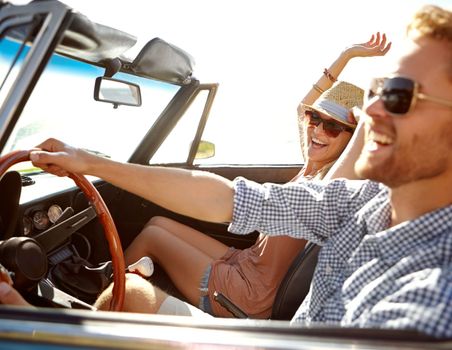 Car road trip, travel and laughing couple on bonding holiday adventure, transportation journey or fun summer vacation. Love flare, convertible automobile and driver driving on Canada countryside tour.