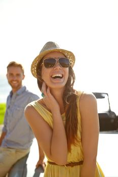 Travel couple, road trip car park and happy woman on holiday adventure, transportation journey or fun summer vacation. Freedom peace, laughing driver and driving girl relax in Portugal countryside.