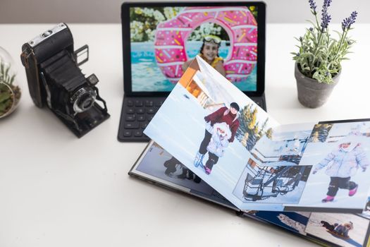 office photography desk table with laptop, tablet, camera. Top view with copy space.