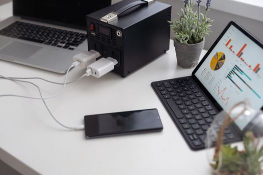 Portable multitasking charging station, power technology.