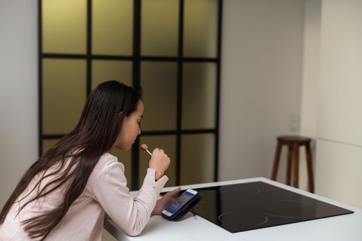 teenager girl using modern smartphone.