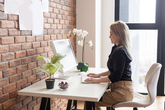 Searching for new solution. a woman with a computer.