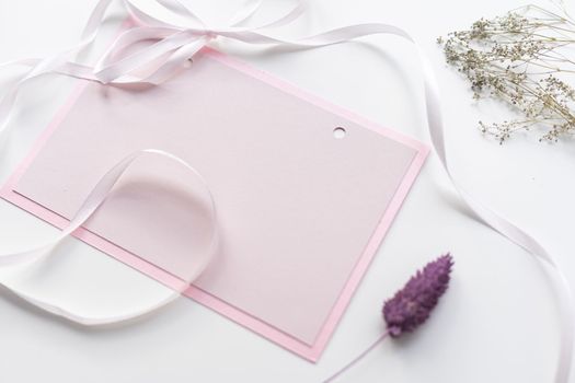 Blank paper card mockup, pastel pink card with wax flowers