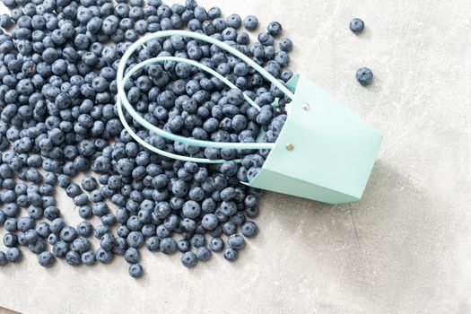 large blueberry with paper basket.