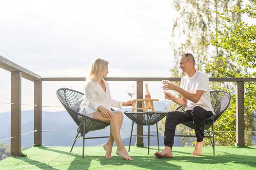 couple on the terrace in the mountains.