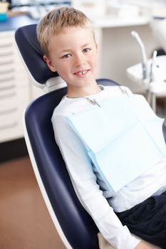 Young child at dentist office. Portrait of smiling little child at dentist office