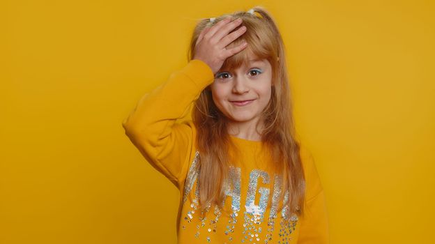 Face palm. Shame on you. Upset young preteen child girl kid making face palm gesture, feeling bored, disappointed in result, bad news. Confused little toddler children isolated on yellow background