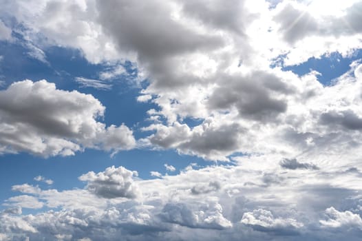 White clouds in a beautiful sky and its reflection