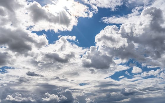 White clouds in a beautiful sky and its reflection