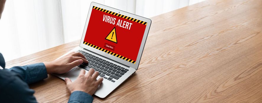 Virus warning alert on computer screen detected modish cyber threat , hacker, computer virus and malware