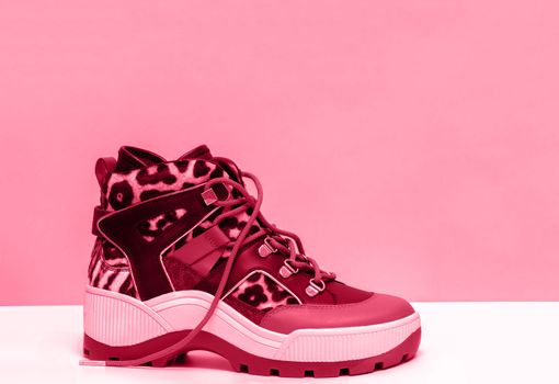Women boots magenta color, trendy fashionable shoes