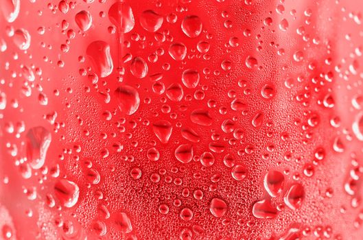 Red drops on glass ,full frame , background abstract