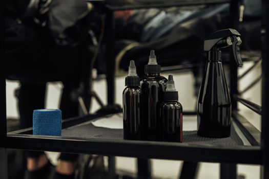 Close Up of Bottles with Ink Inside, Essentials of Creating Tattoo at Studio