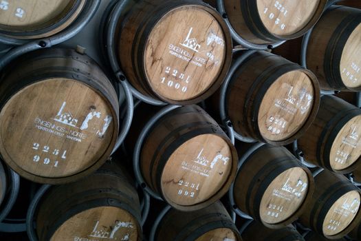 Madeira, Portugal, November 25, 2022: view of casks of rum at a rum and port wine factory in Porto da Cruz on Madeira island, Portugal