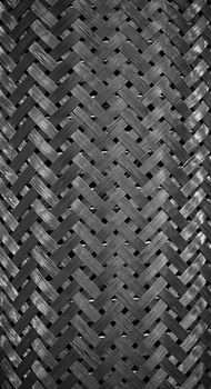 Protective metal braid, steel mesh. Metal wire - abstract background. Metal products and designs. Steel protective sheath braided cable.