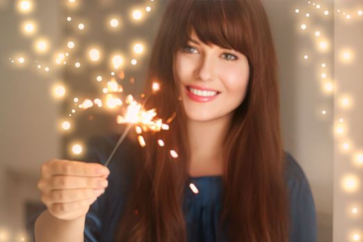 Holiday magic, Christmas and New Year celebration, happy woman with sparklers, portrait