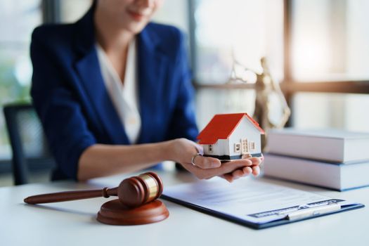 Law, Consultation, Agreement, Contract, Concept Attorney or Lawyer is sitting and accepting complaints from clients for home and land matters in court