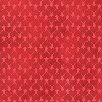 Abstract pattern in the form of hearts on a red background.Macrophotography.Texture or background