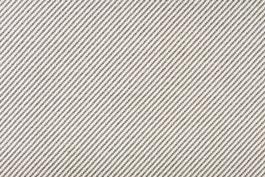 Texture of fabric for furniture upholstery. Wear-resistant fabric for furniture. Texture of gray fabric close up top view