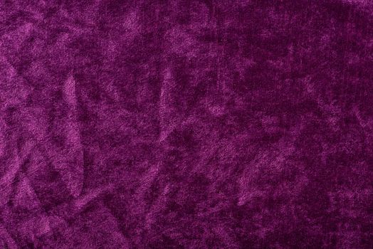 Beautiful purple silk satin background. Soft folds on a shiny fabric. Birthday, Christmas, Valentine's Day. Luxury background with copy space for text, design, web banner