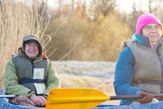 Seniors kayaking, activity. Happy senior. Active elderly early morning concept around the world