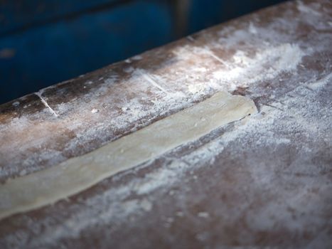 Preparation of flour for making Pa Tong Go or Chinese Traditional Snacks Deep Fried Dough Stick. Concept popular THAI breakfast