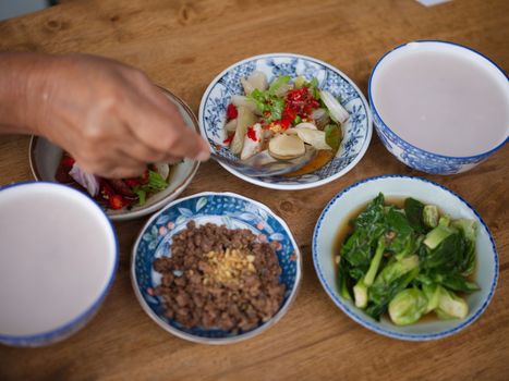 Rice gruel and side dish . Concept breakfast THAI STYLE