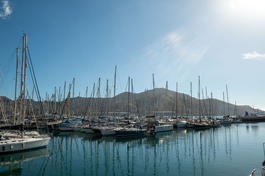 Cartagena, Spain : 2022 November 23 : Marina in the tourist city of Cartagena with moored boats in the autumn of 2022.