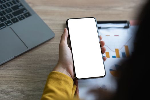 A Woman showing mobile phone screen. Blank screen for your advertising.