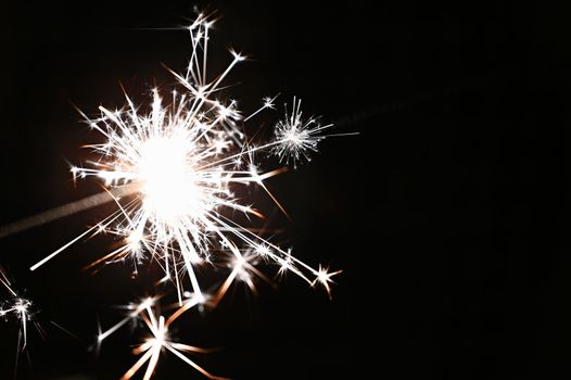 Beautiful abstract shot of sparklers on black background.