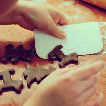 Christmas cookies - gingerbread. Preparation for baking homemade traditional sweets for the Christmas holidays in the Czech Republic.