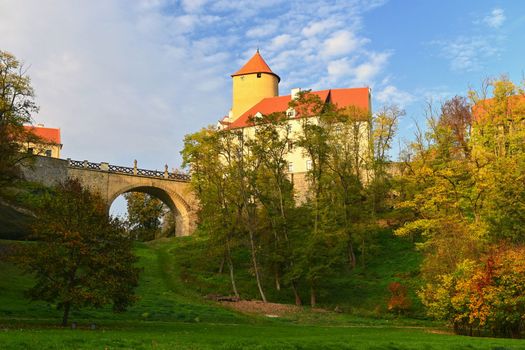 Castle Veveri - City of Brno, Czech Republic - Europe. Beautiful autumn landscape with castle. Brno dam and sunset at the golden hour. Autumn season October.