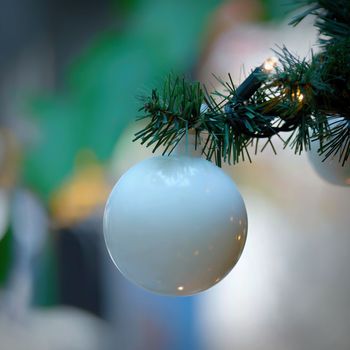 Beautifully decorated Christmas tree with blurred background. Concept for Christmas holidays and winter season.