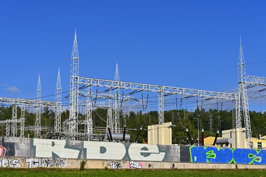 Power plant - electrical energy substation.- High voltage pylons. Concept for technology and industry. Rising energy prices - further rising electricity and energy prices - the energy crisis caused by the war between Russia and Ukraine.