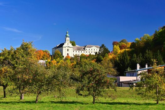 Beautiful old monastery in the autumn landscape. Letovice - Czech Republic.